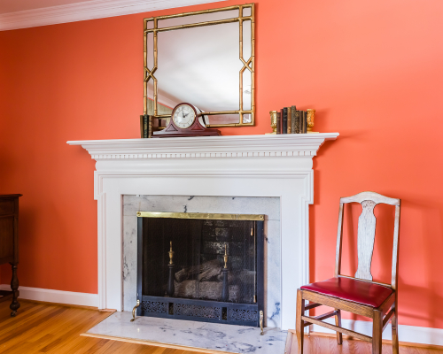 coral walls dining room fireplace bamboo gold mirror coral walls dining room fireplace bamboo gold mirror