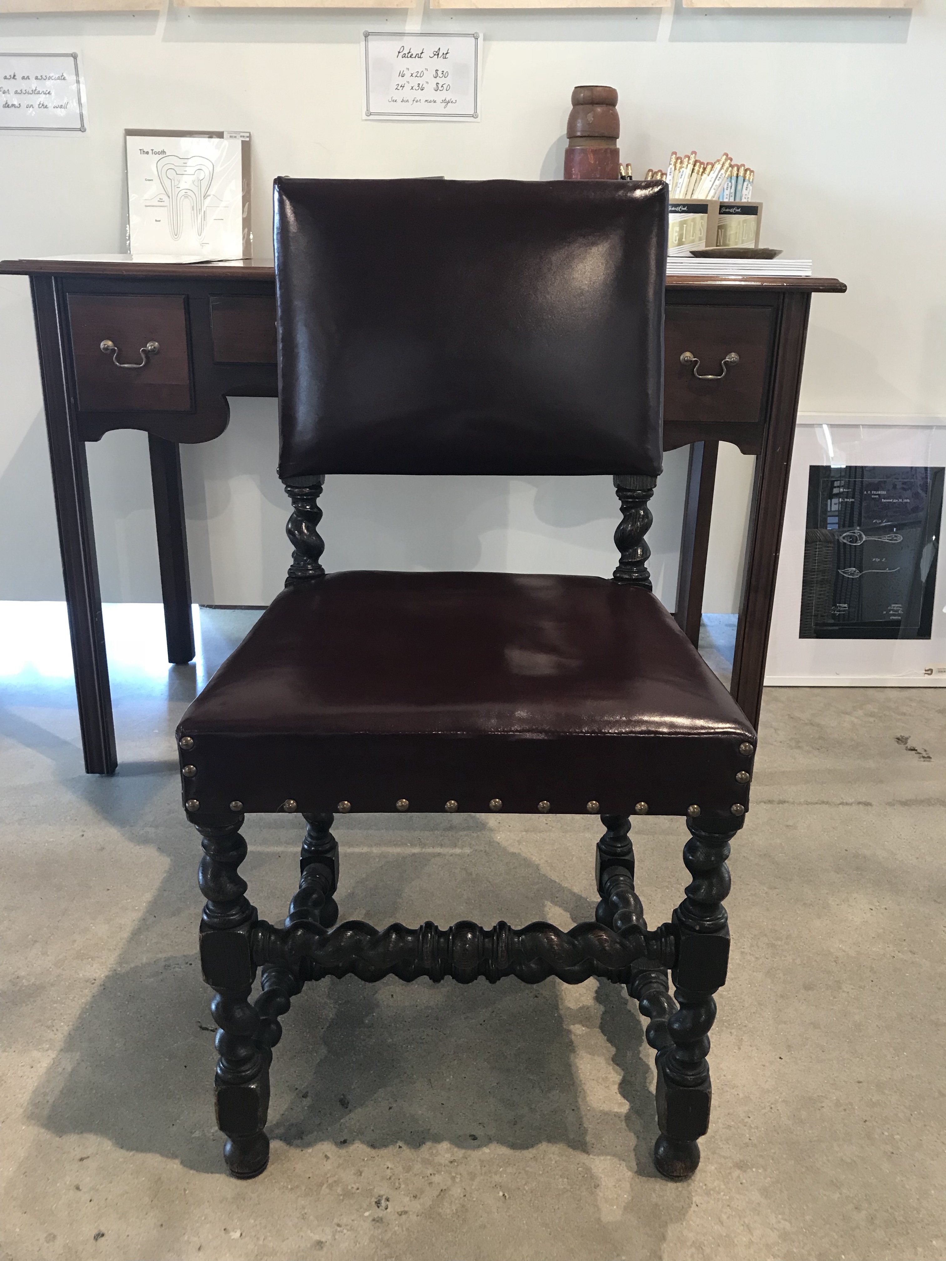 Burgundy Leather Twist Chair - Form & Function - Asheville NC