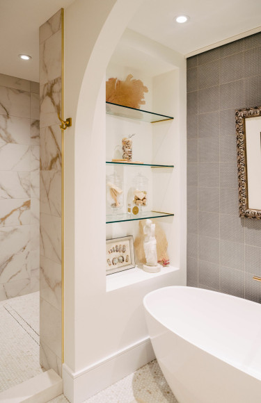 Primary Bathroom Built In Glass Display Shelves Calacatta Gold Porcelain Large Tile
